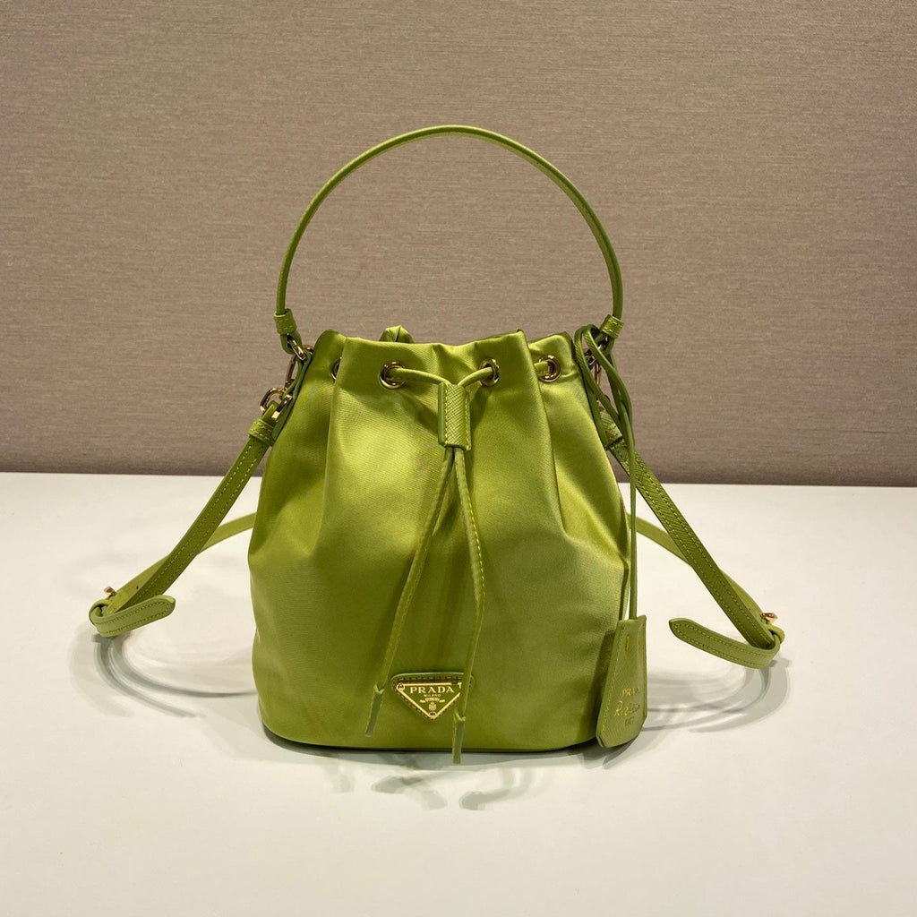 PRADA BUCKET BAG 19 IN APPLE GREEN RE-NYLON AND SAFFIANO LEATHER HANDLE