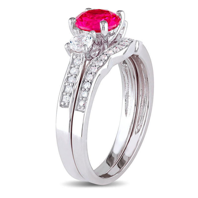6.0mm Lab-Created Ruby and White Sapphire with 1/8 CT. T.W. Diamond Three Stone Bridal Set in 10K White Gold