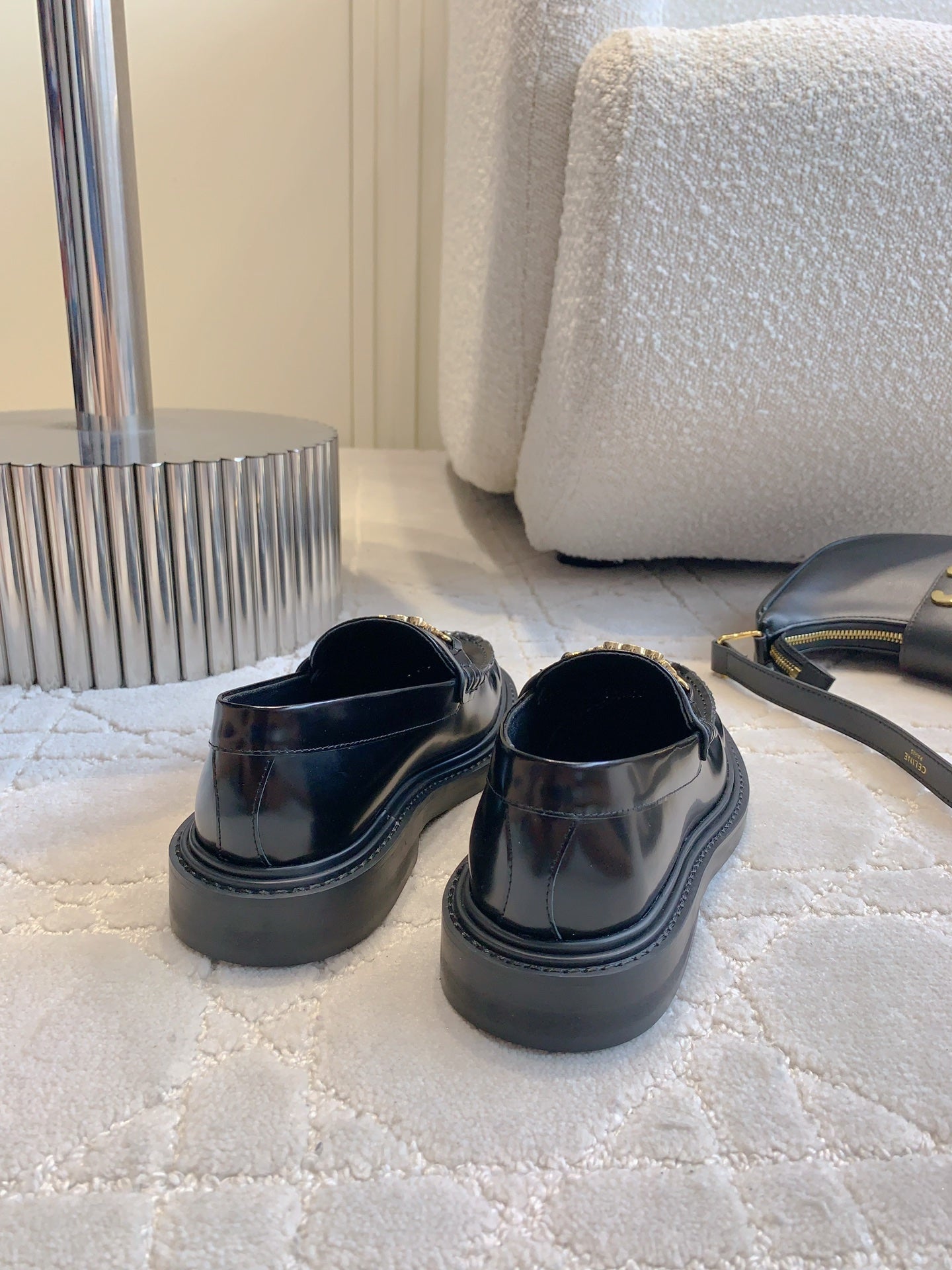 CHANEL 25S ARC DE TRIOMPHE LOAFERS IN BLACK SHINY CALFSKIN GOLD HARDWARE
