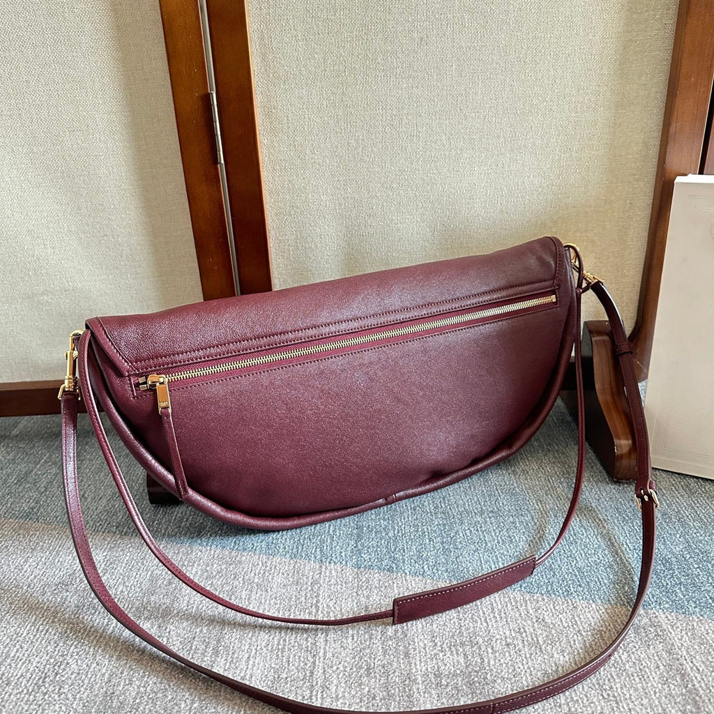 CELINE 25S HALFMOON SOFT TRIOMPHE BAG 46MM IN SYRAH RED SUPPLE SHINY LAMBSKIN